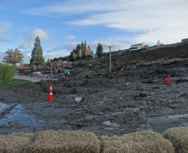 A slow moving slip on the Marina Terrace construction site on Lakeside Rd in Wanaka overnight has blocked the road to all traffic. Photo: Kerrie Waterworth