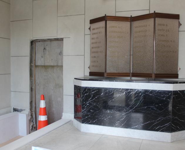 Complaints have delayed the South Otago Historical Society's plans for a new exhibition at the Balclutha War Memorial Hall after it cut a hole in the wall next to the Roll of Honour. Photo: Samuel White