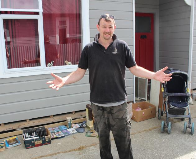 Craig Campbell in his now empty driveway after people in Balclutha took the opportunity to rehome...