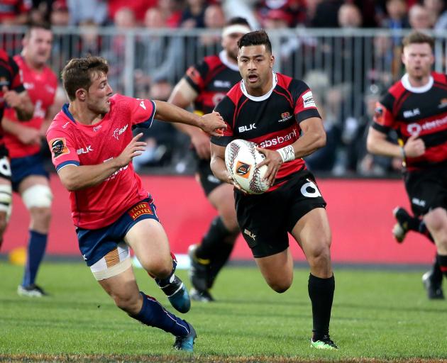 Richie Mo'unga of Canterbury breaks away to score a try during the Mitre 10 Cup Premiership Final match between Canterbury and Tasman. Photo: Getty Images