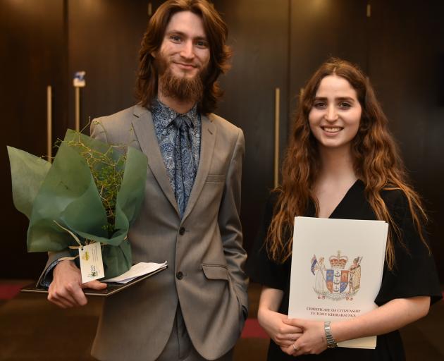 Siblings Avi (23) and Michelle (18) Fridman, originally from Israel, embrace their new Aotearoa citizenship yesterday. Photo: Gregor Richardson