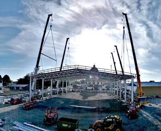 Tuatara Structures erects the roof of Invercargill's new trampoline park on the corner of Nith and Tyne Sts on Saturday. Photo: Supplied