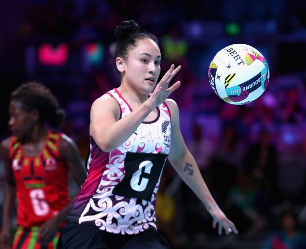 Whitney Souness, of New Zealand, gathers the ball during the Fast5 World Series Netball match...