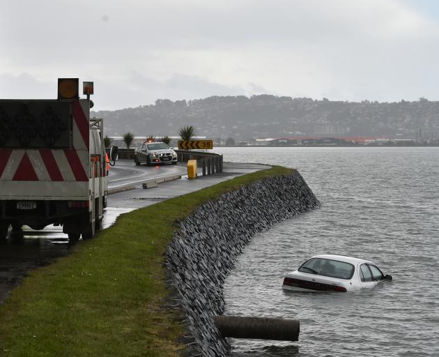 A car crashed into Otago Harbour this afternoon. Photo: Gregor Richardson