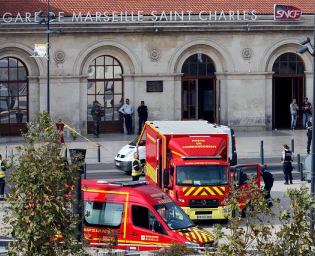 Emergency services vehicles are seen outside the Saint-Charles train station after French soldiers shot and killed a man who stabbed two women to death. Photo: Reuters