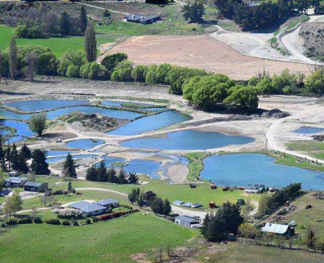 Graham Lee and wife Hayley have spent millions of dollars developing a salmon fishing complex beside the Cardrona River. Photo: Kerrie Waterworth