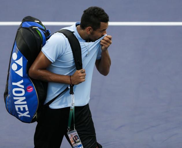 Nick Kyrgios leaves the court at the Shanghai Masters earlier this week. Photo: Reuters