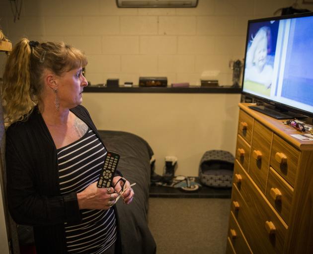 At her home in Oxford, near Christchurch, Nicola Cruickshank watches a recorded version of the...