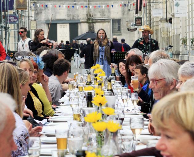 More than 70 people gather in Harbour St in April for the Forrester Laneway Long Lunch. Photo: Hamish MacLean