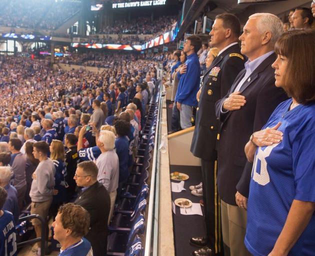 Vice President Mike Pence and Second Lady Karen Pence stand during the national anthem prior to...