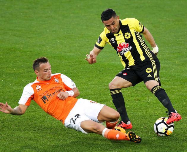 Eric Bautheac of Brisbane tackles Ali Abbas of the Phoenix during the round four A-League match between the Wellington Phoenix and the Brisbane Roar at Westpac Stadium on October 28, 2017 in Wellington, New Zealand. (Photo by Hagen Hopkins/Getty Images) Eric Bautheac of Brisbane tackles Ali Abbas of the Phoenix during the round four A-League match between the Wellington Phoenix and the Brisbane Roar at Westpac Stadium on October 28, 2017 in Wellington, New Zealand. (Photo by Hagen Hopkins/Getty Images)