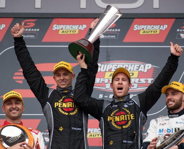 Luke Youlden and David Reynolds on the podium after winning at Bathurst yesterday. Photo: Getty...