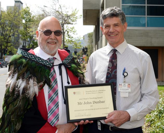 Dunedin School of Medicine dean Prof Barry Taylor (left) congratulates orthopaedic surgeon John...