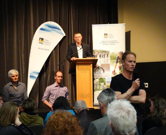 Guest speakers (from left) freshwater scientist Dr Marc Schallenberg and Landcare researcher Dr Phil Novis and ORC chairman Stephen Woodhead (at podium) listen to Queenstown Lakes District Council project manager Rob Darby at the lake snow information eve