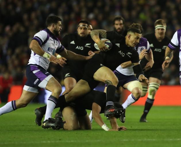 Sonny Bill Williams is tackled for the All Blacks in their match against Scotland at the weekend....