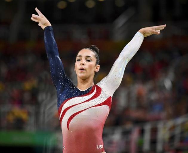 Alexandra Raisman of USA competes on the beam during the women's team final in Artistic Gymnastics at the 2016 Rio Olympics. Photo: Reuters