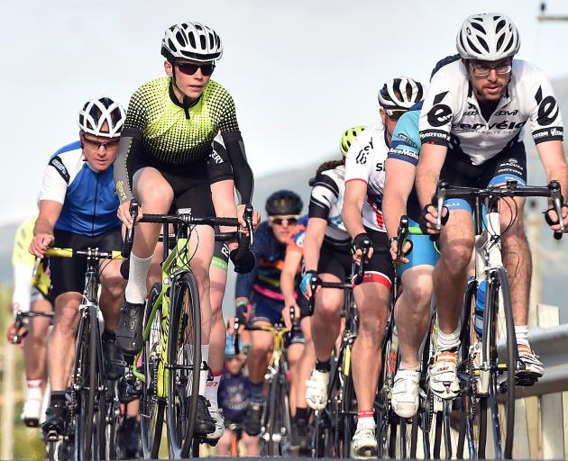 Grayson Westgate (14, left) and Nick Hoskins lead the category 4 mixed cycle race along Wairongoa...