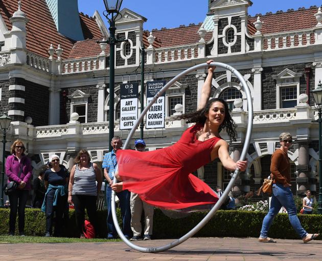Cirkopolis acrobat Rosita Hendry performs with a Cyr wheel at the Dunedin Railway Station yesterday. Photo: Stephen Jaquiery