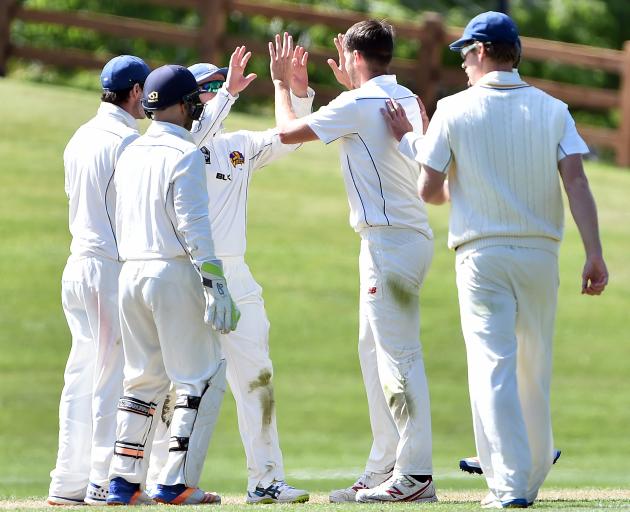 Otago players celebrate the wicket of Ross Taylor, albeit in vain. Photo: Peter McIntosh