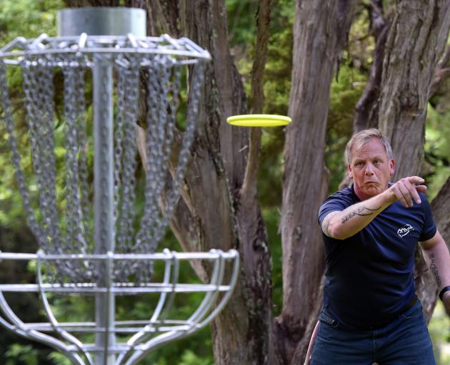 Leon Botha, of Christchurch, floats his disc towards a  target at Waiora Scout Camp yesterday....