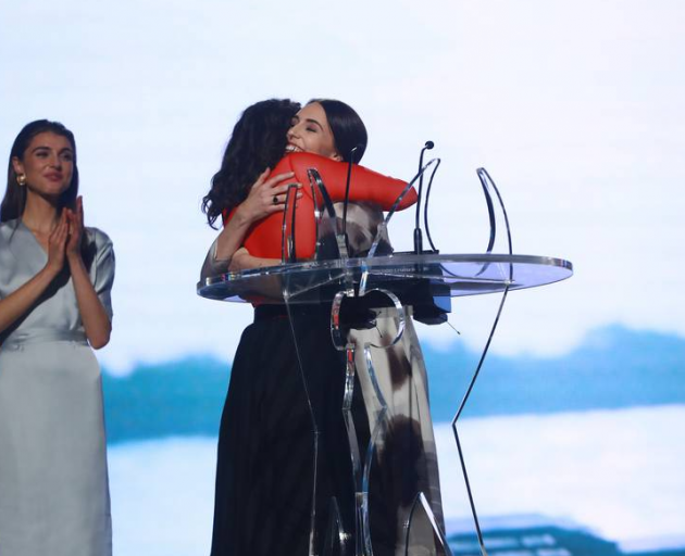 Jacinda Ardern and Lorde shared an embrace on stage after Ardern presented Lorde with the People...