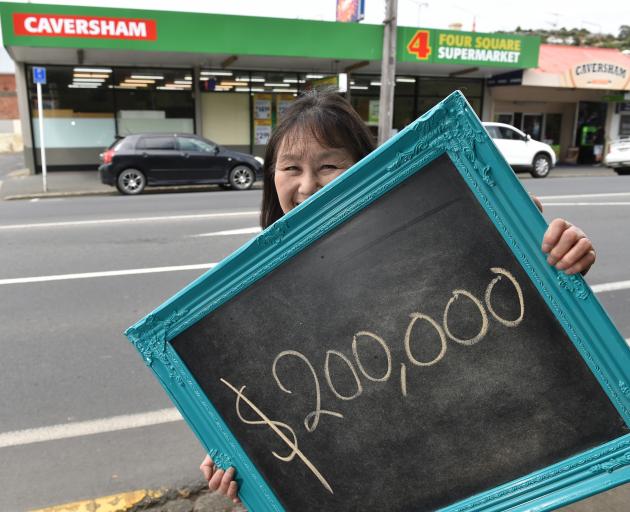 Caversham Four Square owner Sandra Shum is searching for a lucky customer yet to claim their $200...