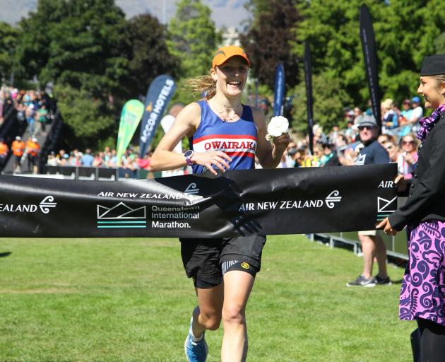 Hannah Oldroyd crosses the finish line to win the women’s section of Saturday’s Queenstown...