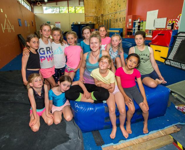 Queenstown Gymnastics Club coach Melissa Reifsteck and recreational class intermediate students at their Wakatipu High School gym base. The club is hoping the Ministry of Education will grant it a stay of execution once the school closes at the end of the