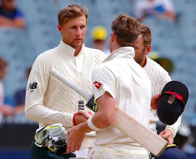 England's captain Joe Root shakes hands with Australia's captain Steve Smith to end the fourth Ashes cricket test match in Melbourne. Photo: Reuters