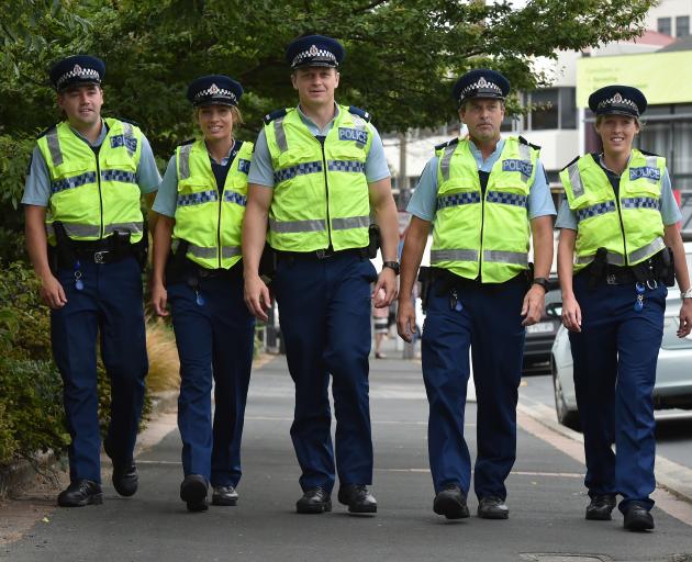 Christmas Crime Prevention team members (from left) Constable Daniel Napier, Constable Mel Duff, Acting Sergeant Matt Davidson, Senior Constable Richie Ellwood and Constable Kat Radford. Photo: Gregor Richardson