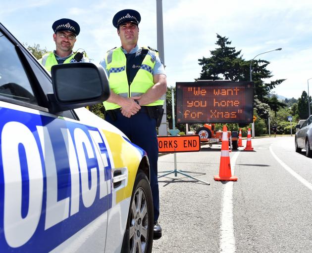 Acting Senior Sergeant Bryce Johnson (left) and Acting Otago Coastal Area Road Policing manager...