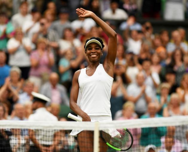 Venus Williams waves to the crowd after her quarterfinal win. Photo: Getty Images