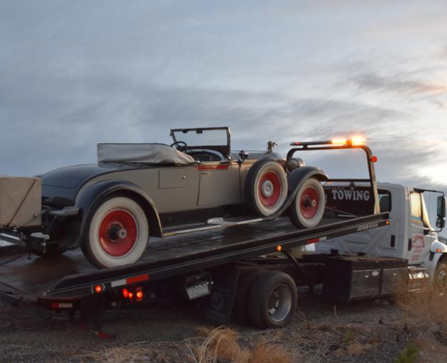 Craig and Nicky Marshall's 1928 Packard Roadster is towed to Los Angeles after breaking down on their trip across the United States. It will be repaired in Auckland before making its way down to Wanaka for next year's Warbirds Over Wanaka airshow. Photo: 