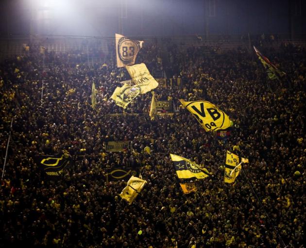 Borussia Dortmund fans, who contribute to making the Bundesliga the Europe highest attended...