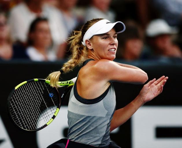 Caroline Wozniacki plays a shot during her opening ASB Classic match yesterday. Photo: Getty Images