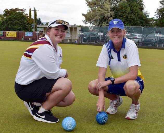 Ashleigh Jeffcoat (18) and  Katelyn Inch check out the Taieri greens in preparation for their...