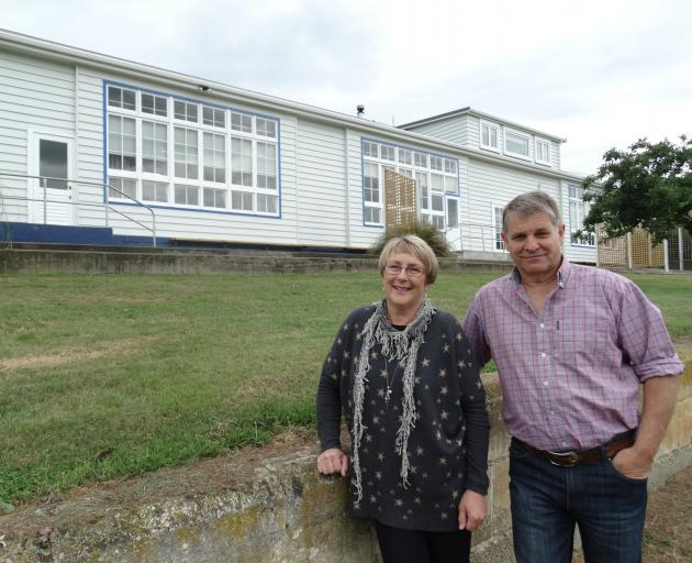 Craig and Blanche Sturgess outside their Enfield property, formerly Enfield School. Photo: Daniel Birchfield