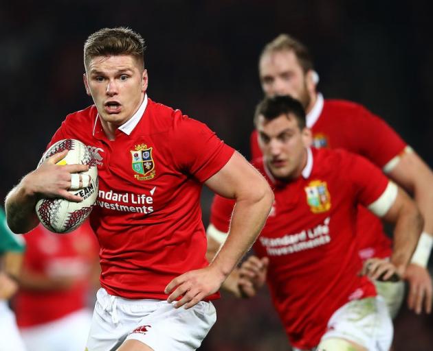 Owen Farrell runs the ball for the British and Irish Lions in New Zealand last year. Photo: Getty...