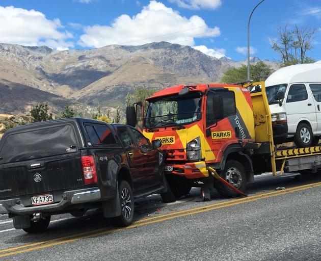 Glen Collins' tow truck was bumped into a stationary Holden Colorado after a tourist driver pulled out in front of him at Arrow Junction near Queenstown on Tuesday. Photo: Meena Amso