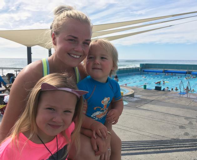 Mikayla Dixon, of Dunedin, and her children Paiyton (6) and Boston (3) enjoy their visit to St Clair Hot Salt Water Pool on Tuesday. PHOTO: SHAWN MCAVINUE