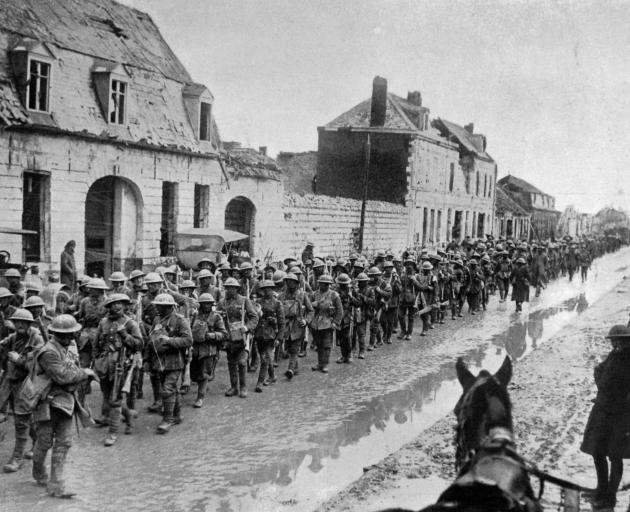 On the Western Front: British troops returning to a rest camp after several days fighting in the trenches. - Otago Witness, 20.2.1918.