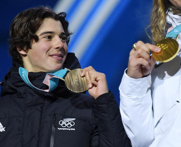 Nico Porteous eyes up the gold while showing off his bronze medal from the Winter Games in South...