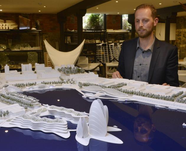 Architect Damien Van Brandenburg with a model of his vision for the Otago Harbour Steamer Basin....