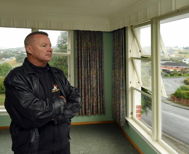 Landlord Mark Cowan stands in his Balclutha rental property, which has tested positive for...