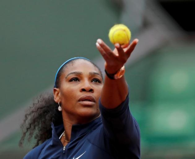 Serena Williams prepares to serve against Magdalena Rybarikova.  Photo Reuters