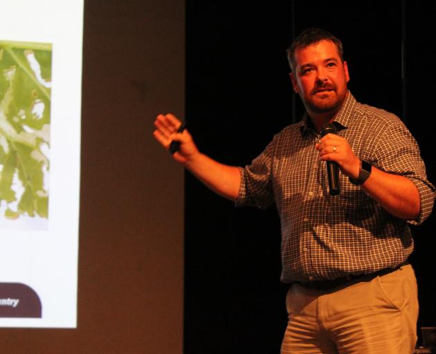 PGG Wrightson national technical team manager Milton Munro talks to farmers about what options are available for saving their crops. Photo: Nicole Sharp