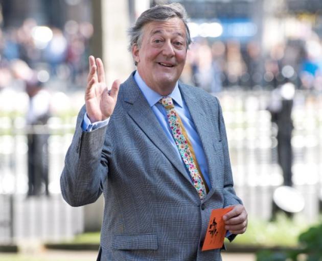 Actor Stephen Fry at Westminster Abbey in London. Photo: Reuters