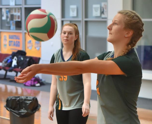 Eva Hoffmans digs the ball in a volleyball game for Bayfield High School at the Edgar Centre...