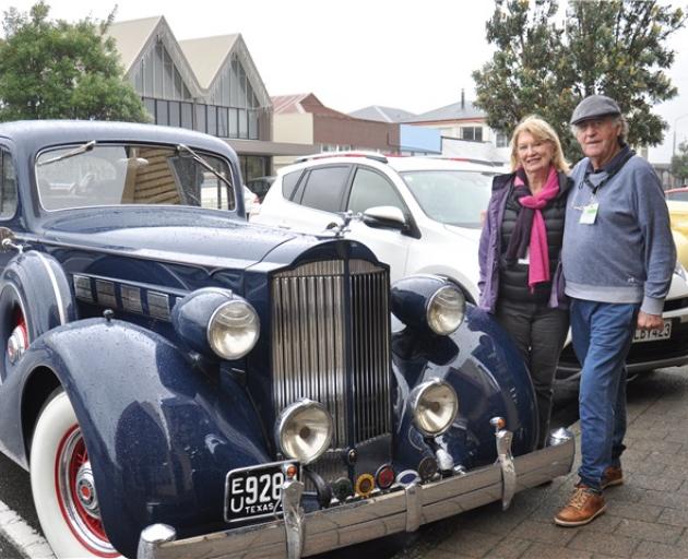 Gold Coast couple Ross and Robyn Marshall with their 1935 Packard. Photo: Hokitika Guardian