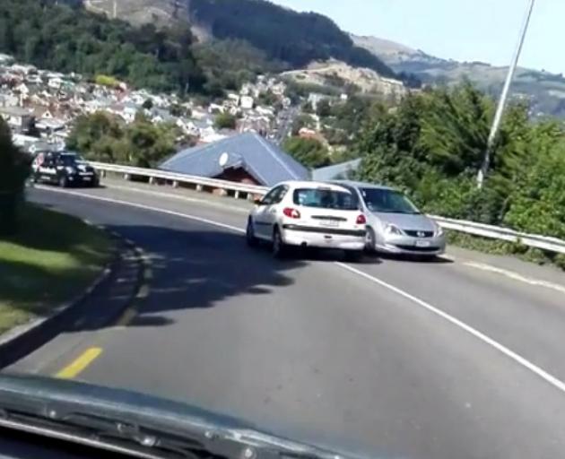 A still from a video shot by Dunedin man Richard Mountain which shows another motorist repeatedly crossing the centre line on Sunday. Photo: Supplied